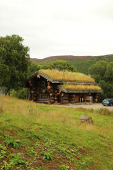 Fototapeta na wymiar Eco log cabin in the hills of scotland 