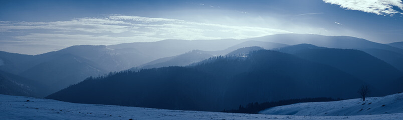sun over the winter mountains with snow, Cindrel mountains, Paltinis, Romania
