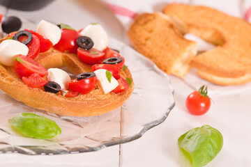 Friselle with tomatoes and mozzarella cheese.