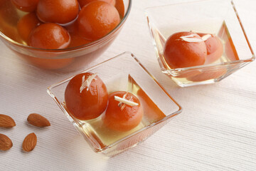 Gulab Jamun with almond toppings an Indian sweet