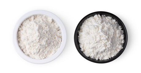 Pile of flour in a bowl isolated on white background