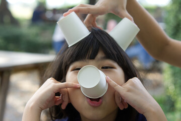 Portrait Asian cute child girl 7 years old smiling happy