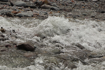 Heddon river flowing through the valley and over rocky ground