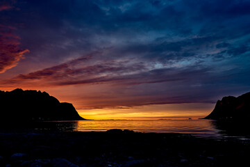 Obraz na płótnie Canvas dramatic and colorful sunset over the sea