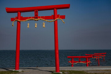 Red Shinto Shrines at the full tide