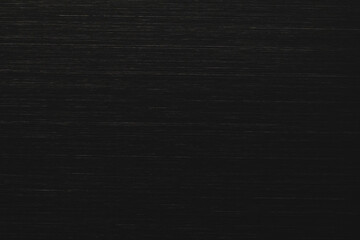 Texture of black anodized brushed aluminum.