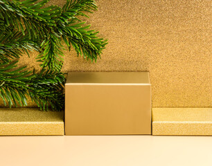 Golden podium for product presentation on beige and luxury glitter gold background, fir tree...
