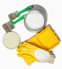 paint in an iron pot, paint tray and brushes with yellow Gloves