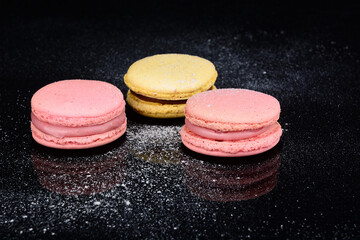 macaroons on black background