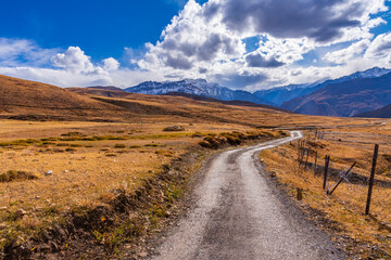 Beautiful landscape view alpine landscape enroute unpaved road connecting Kaza town with Langza village in Lahaul Spiti region of Himalayas in Himachal Pradesh, India.