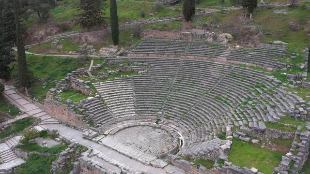 Drone video of iconic Temple of Athena Pronaia in archaeological site of Delphi, Voiotia, Greece