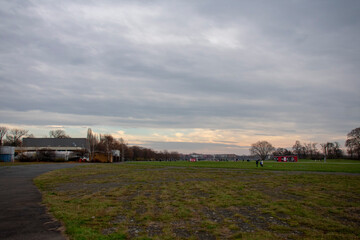 Fototapeta premium Landscape of field at abandoned Tempelhof Airport in Tempelhof Berlin Germany