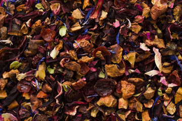 Close up of loose fruit tea; full frame; dried flowers and leaves; background
