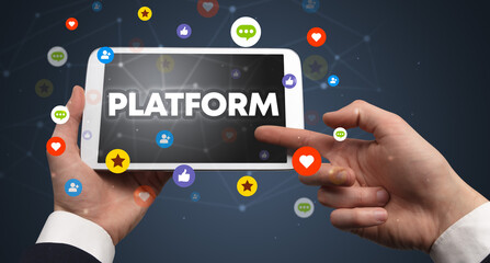 Close-up of a touchscreen with PLATFORM inscription, social networking concept