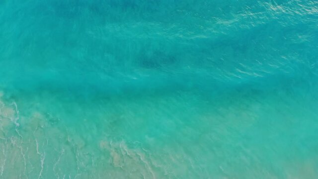 Aerial panorama of beautiful beach of turquoise ocean water at waves aerial view
