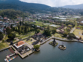 Aerial view of Ulun Danu Beratan Temple, picturesque landmark temple in Bali’s central highlands. The temple sits on the western side of Beratan Lake.