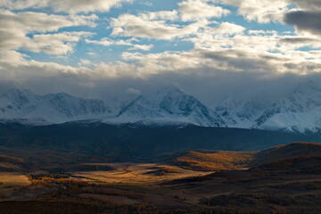 Russia. South Of Western Siberia, Mountain Altai. Autumn sunset in the North-Chuyskiy mountain range in the heart of the Kurai steppe.