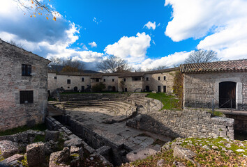 Altilia,Sepino,Molise,Italy,05/12/2020: the Roman Theater surrounded by some houses and the City and Territory Museum.