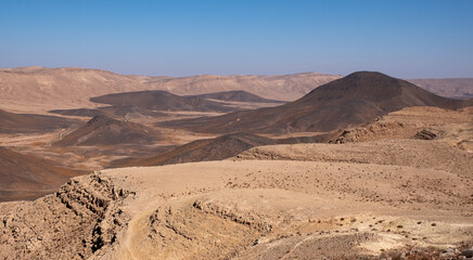 Desert landscape at Makhtesh Ramon Crater, nature reserve in Negev desert, Israel. Diversity of...