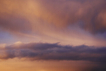 Fototapeta na wymiar sunset in the clouds with rain showers 