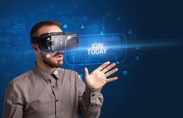Businessman looking through Virtual Reality glasses with JOIN TODAY inscription, social networking concept