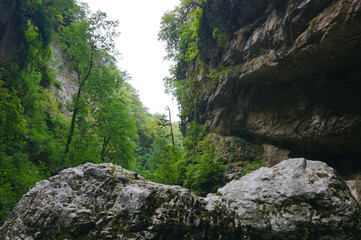 Waterfall Dragon's mouth, Sochi, Krasnaya Polyana, nature of Russia, rocks.