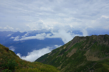 Obraz na płótnie Canvas Mountains, peak, horizon, clouds, Krasnaya Polyana, North Caucasus, nature of Russia.