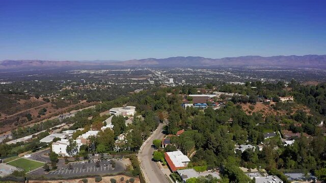 Aerial wide shot of the San Fernando Valley with the 405 Freeway. HD at 60 FPS.