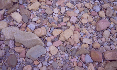 Rocks and pebbles on the riverbank.