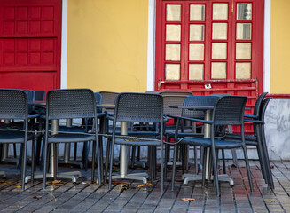 Cafe tables, seats tied, Athens Greece. Closed shop, COVID 19 Pandemic lockdown.