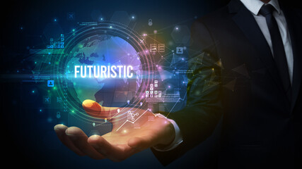 Elegant hand holding FUTURISTIC inscription, digital technology concept