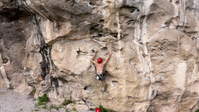 Rock climbers ascending steep rock face in Getu Valley, China