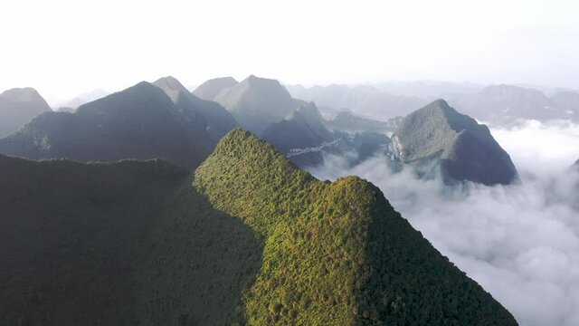 Beautiful Getu Valley karst mountain landscape in China, cloudy aerial view