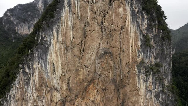 Karst mountain rock face, rock climbing in rural China, Getu Valley, aerial
