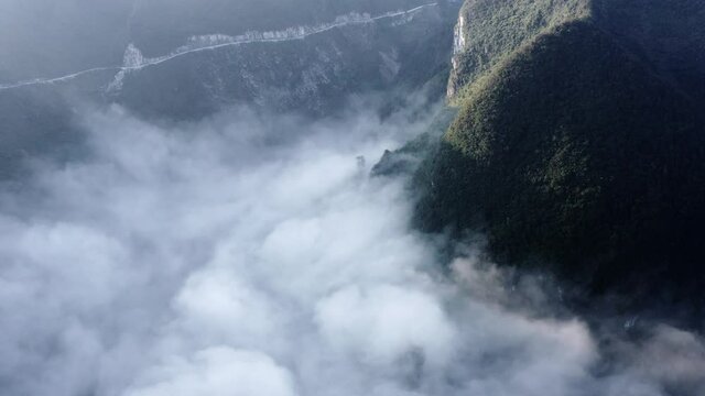 Dramatic cloudy karst mountain landscape, China, aerial view
