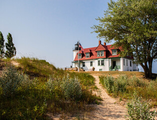 A lone lighthouse that guards the lakes edge