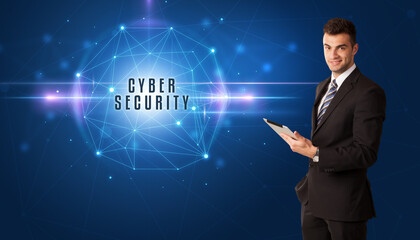 Businessman thinking about security solutions with CYBER SECURITY inscription