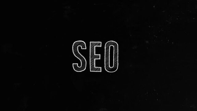SEO concept written on blackboard. Search engine optimization is the process of improving the quality and quantity of website traffic to a website or a web page from search engines