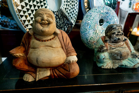 Carved wooden figures representing Buddha