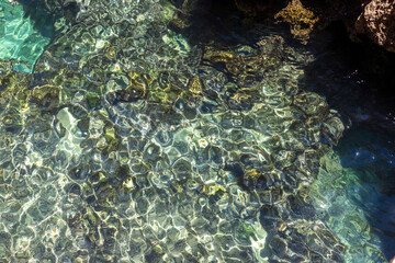 Fototapeta na wymiar Crystal clear water, Mediterranean sea, Algar Seco, Algarve 