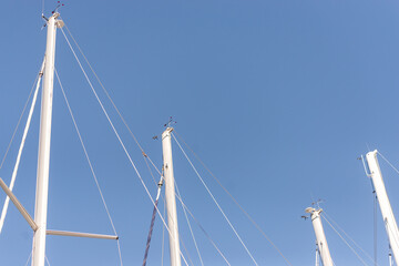 Top of the yacht's mast. Equipment on the top of the mast. Wind meter and weather indicator.