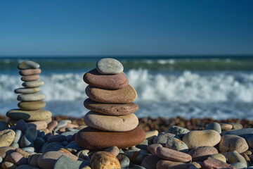 pyramid of stones with sea view