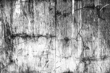 Texture of a concrete wall with cracks and scratches which can be used as a background