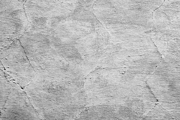 Texture of a concrete wall with cracks and scratches which can be used as a background