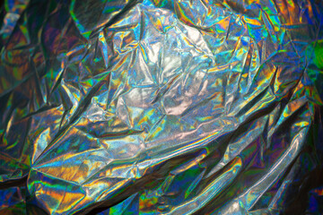 Iridescent fabric trendy holographic background.