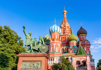 Fototapeta na wymiar Monument to Minin and Pozharsky and Cathedral of Vasily the Blessed (Saint Basil's Cathedral) on Red Square, Moscow, Russia