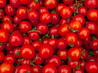 red tomatoes in the supermarket, on the counter