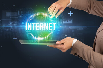 Close-up of a touchscreen with INTERNET inscription, new technology concept