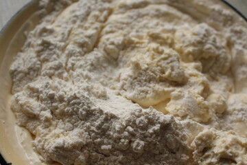 
Flour added to the dough on top