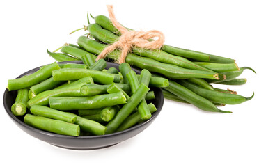 green beans in a black plate isolated on white background. Clipping path and full depth of field